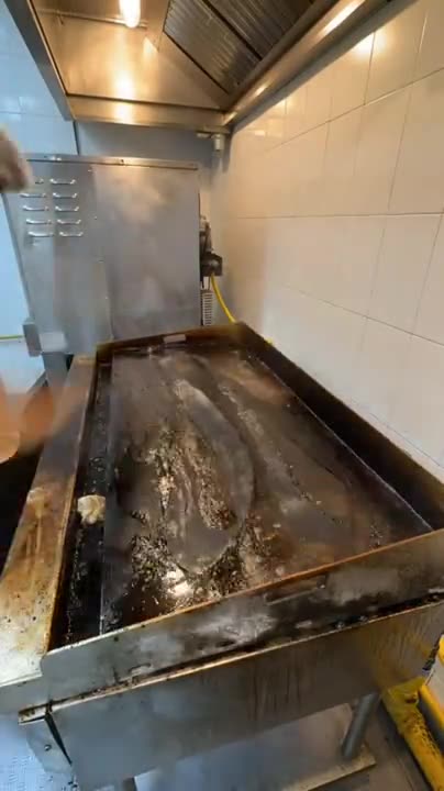 Cleaning the kitchen girll at the end of the day