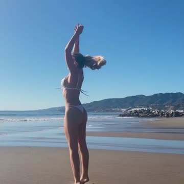 Tommi rose wearing bikini beach looking sexy