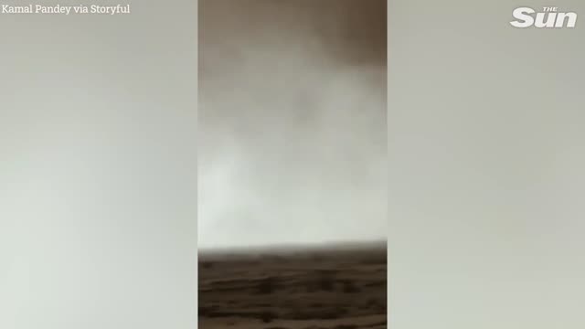 Massive funnel cloud swirls near Doha, Qatar during the World Cup