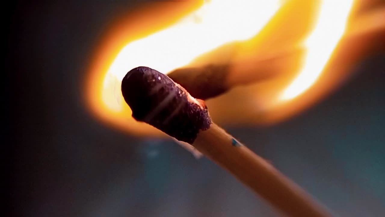 Slow-Mo closeup of match stick