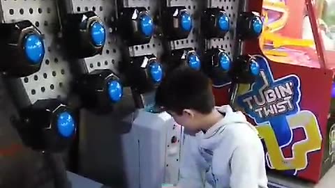 Boy is playing and enjoying his favourite indoor game