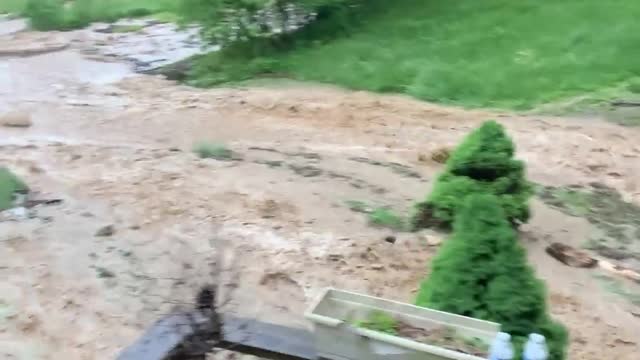 Sudden Flood Forces Family to Flee Home