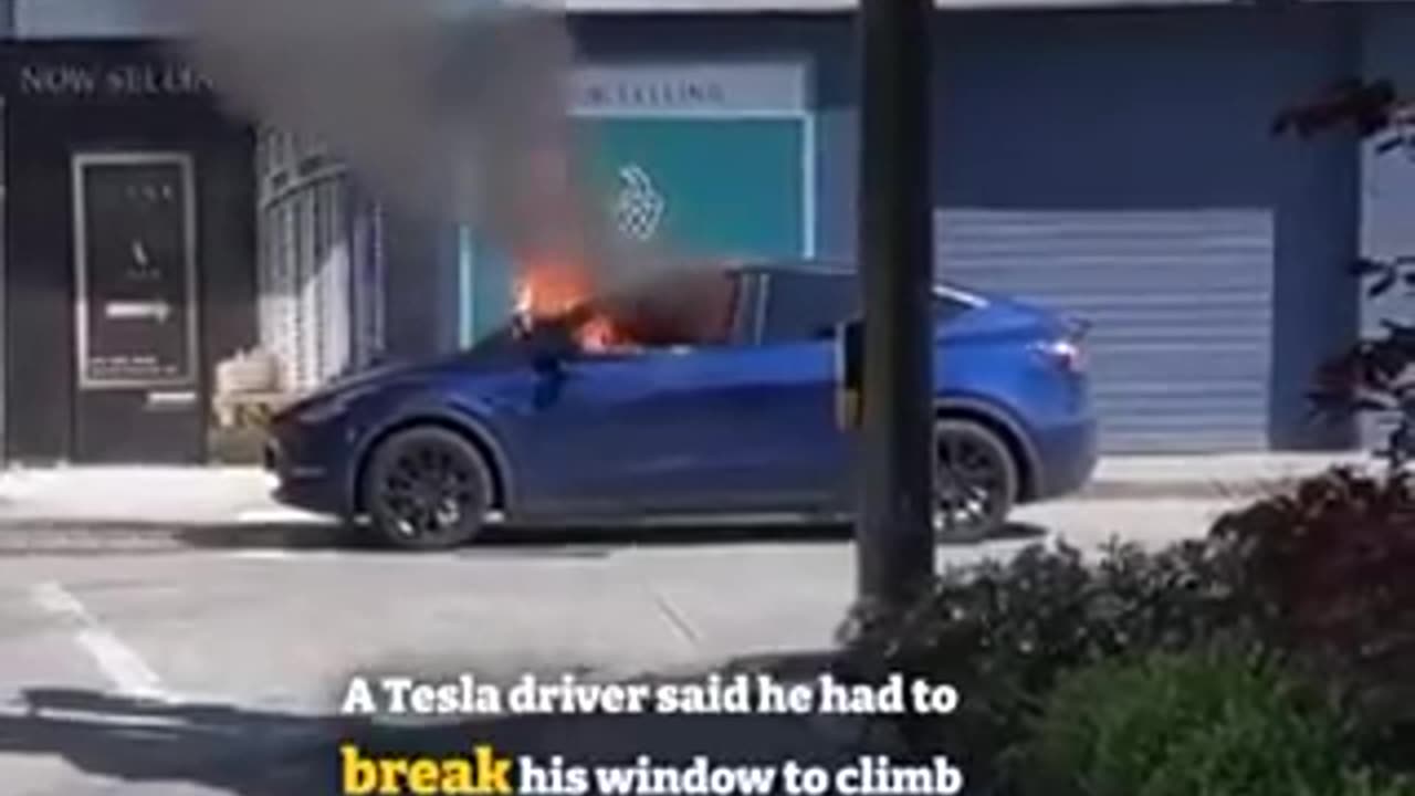 Tesla locked driver in car as it burst into flames....