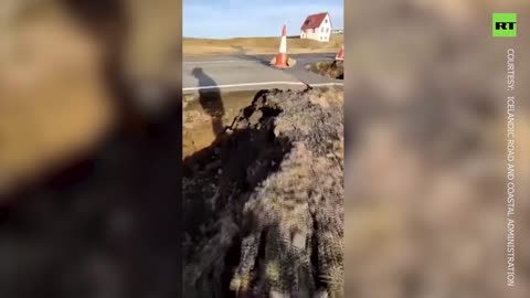 Series of continuing small earthquakes cause cracks in Iceland road.mp4