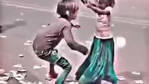 Two homeless kids dancing on a street gone viral