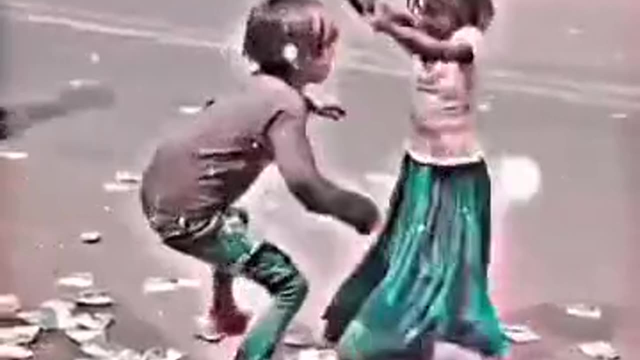 Two homeless kids dancing on a street gone viral