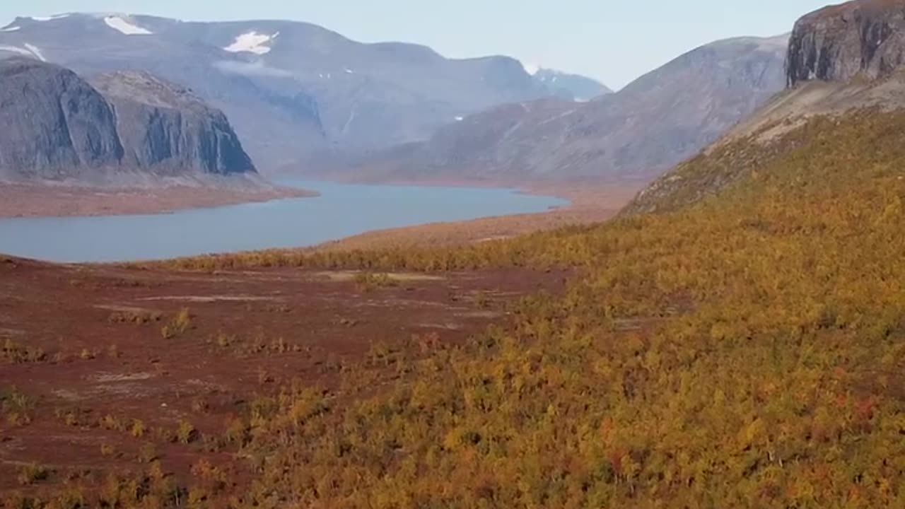 Hiking Kungsleden in fall _ Kvikkjokk - Saltoluokta _ Sweden Lapland _ September autumn Hike