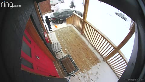 Ring Camera Captures a Guy, Holding a Shovel, as He Slips Down the Steps