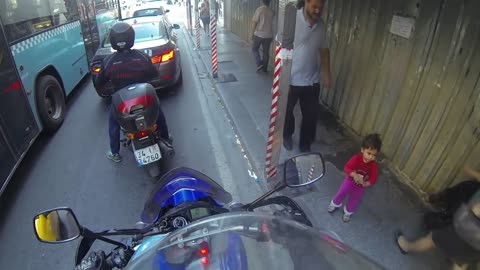 Curious Child On the Sidewalk