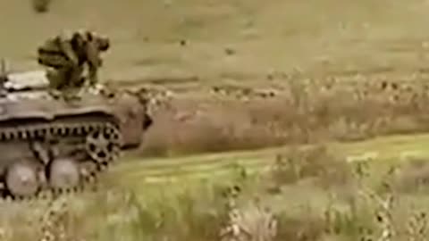 Russian Soldiers 'Filmed Surrendering' With White Flag Flying From Their Tank