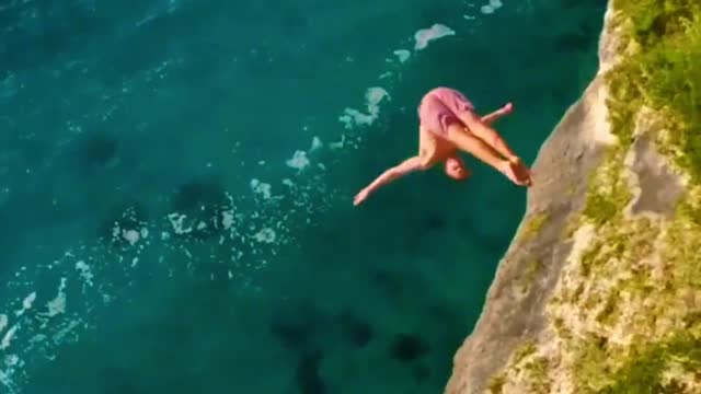 Cliff diving in Bahamas. Do you dare to play recommendation officer?