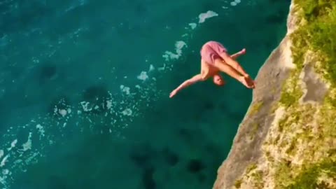 Cliff diving in Bahamas. Do you dare to play recommendation officer?