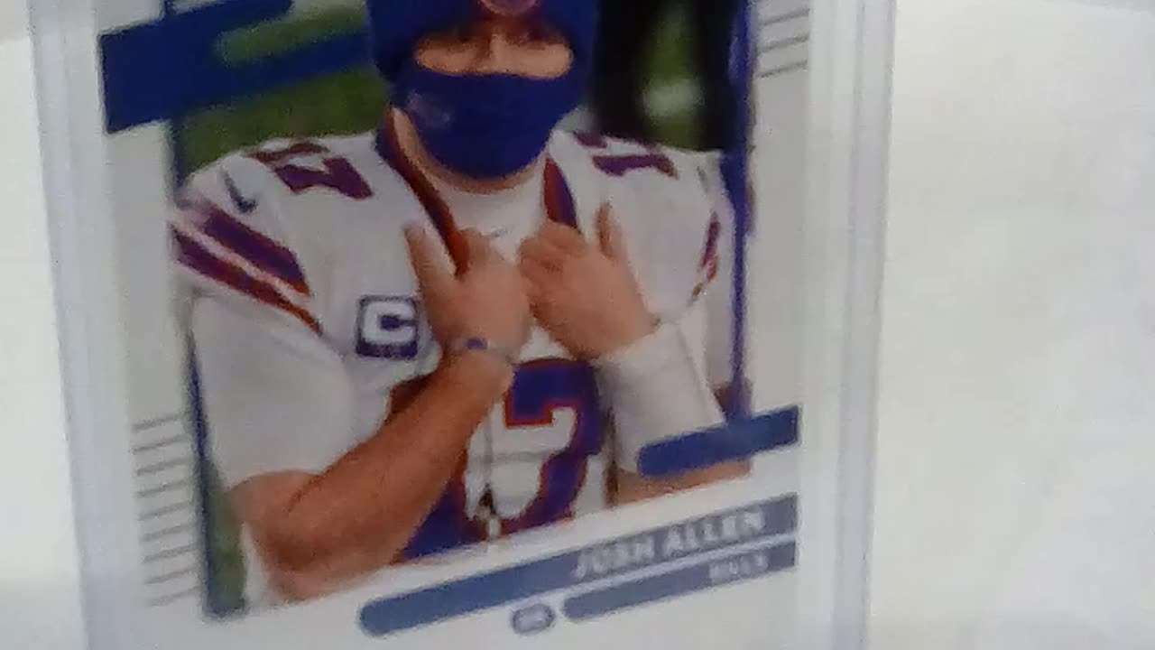 Josh Allen Buffalo Bills wearing the useless Fauchi Mask. Donruss No Helmet Mask Variant Card