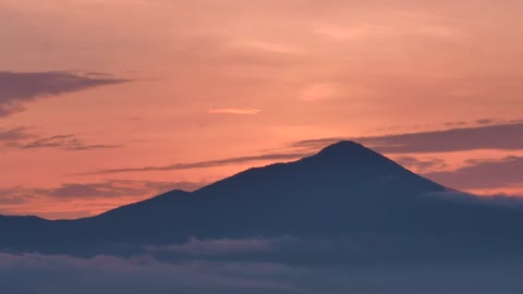 A mountain silhouette during sunset