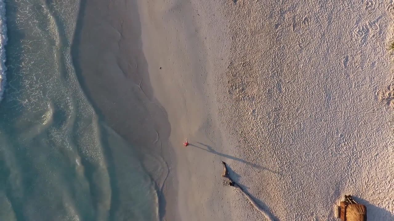 Runner On The Beach - Aerial Shots