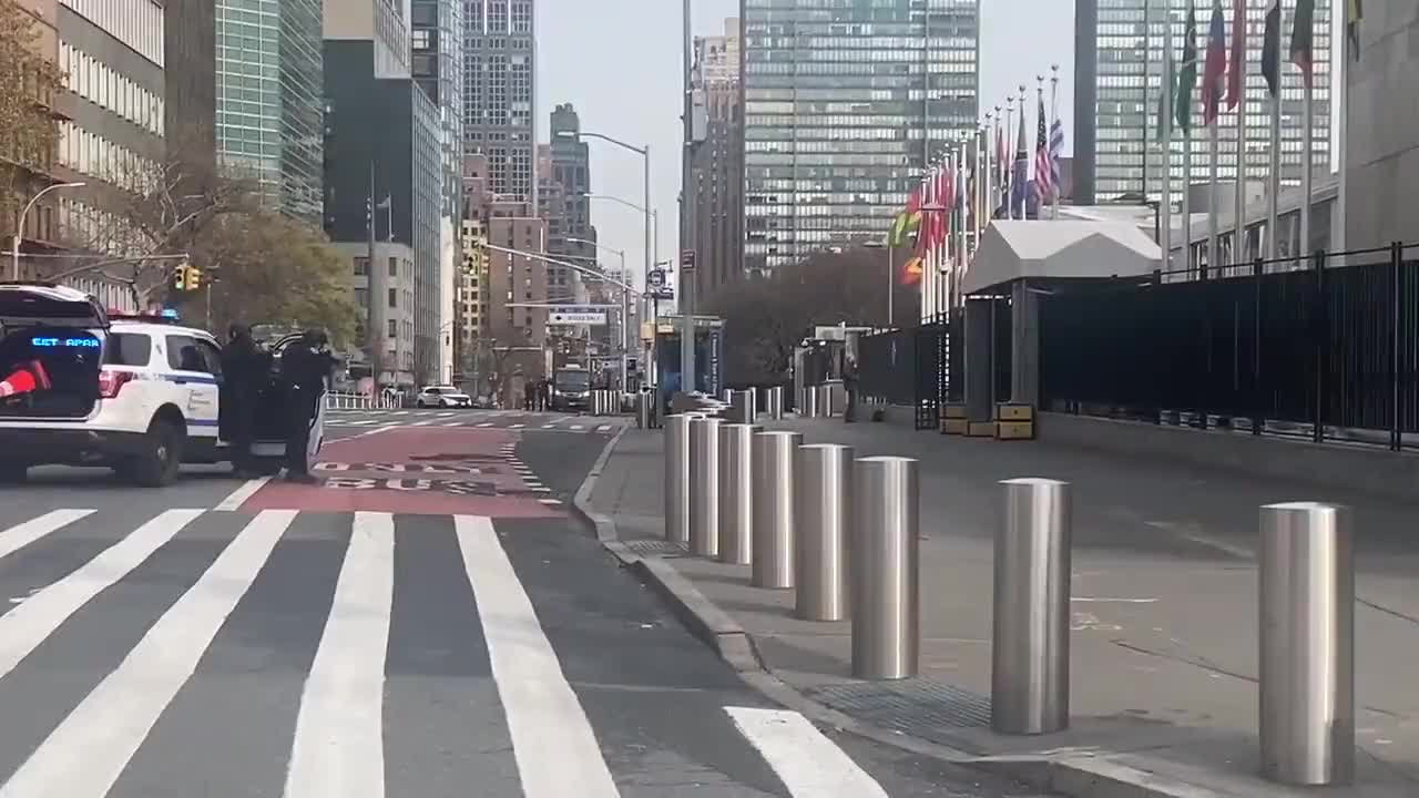 United Nations HQ in New York surrounded by police responding to a man armed with a shotgun.