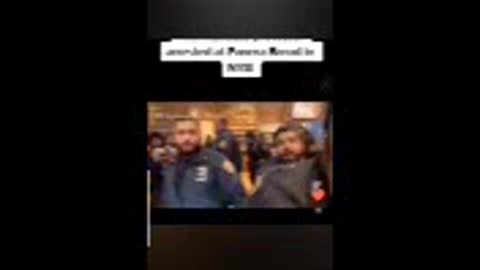 NYPD steps on the flag while arresting someone for not showing their Vax papers in a restaurnat