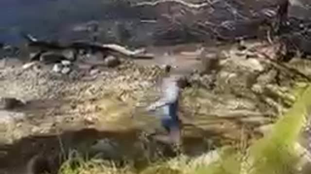 Guy Attempting to Rope Swing Tumbles Downhill
