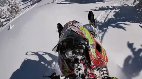 Guy Hit a Hidden Rock Riding His Sled Sending Him Over the Bars