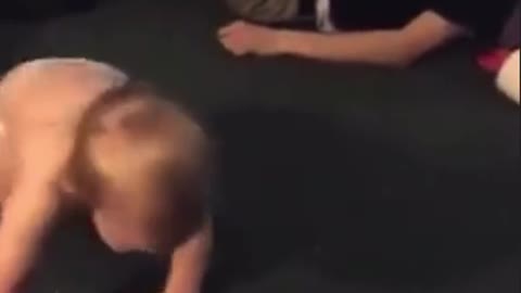 Baby Fakes Out Man with a Slap