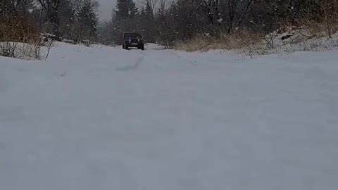 1857# Jeep playing in the snow after plowing snow