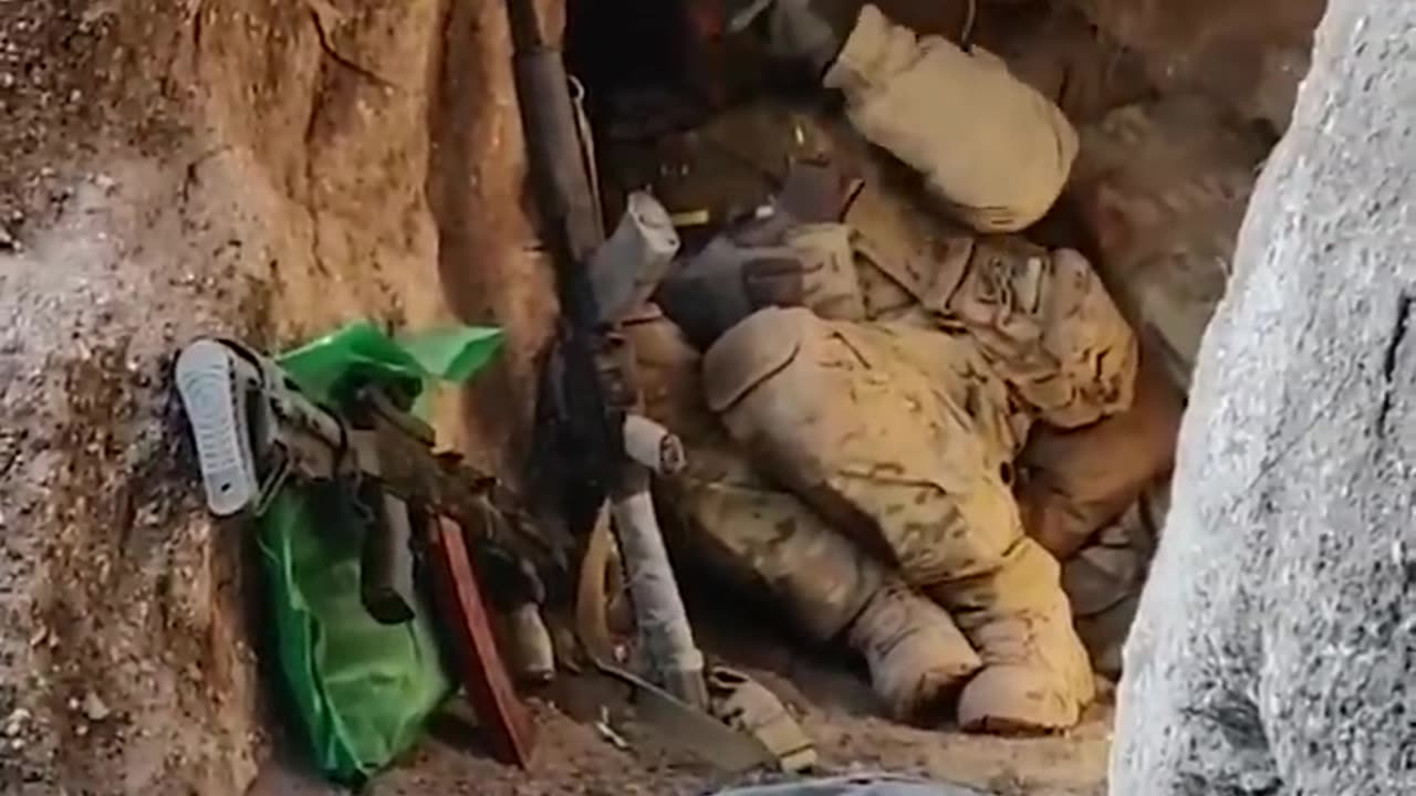 Ukrainian_soldiers_barely_avoid_Russian_bomb_as_they_hide_in_a_trench