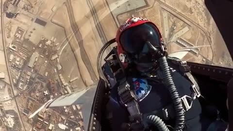 climbs through the vertical during a practice demonstration over Nellis AFB yesterday