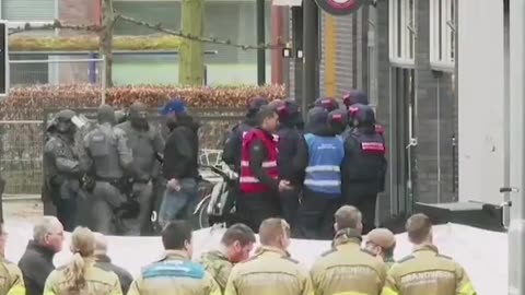 migrant armed with guns and explosives has taken hostages at a nightclub in Ede, the Netherlands.