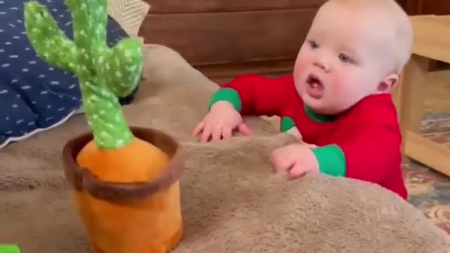 cute babies scared by toy