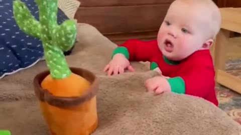 cute babies scared by toy