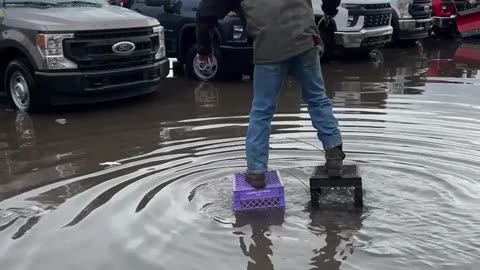 Crazy Man Crate Walks In Flood