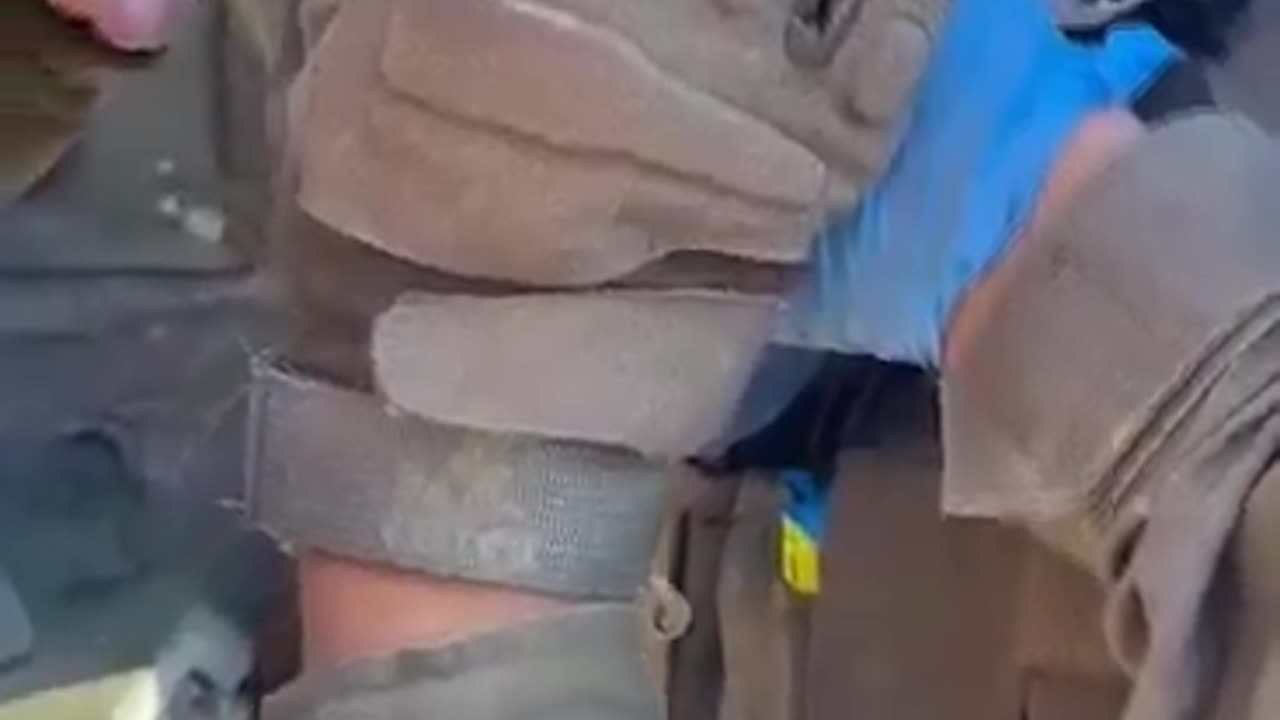 Israeli soldiers rescues a baby dog in Gaza