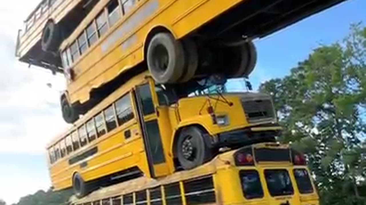 How many school Buses can we stack ?