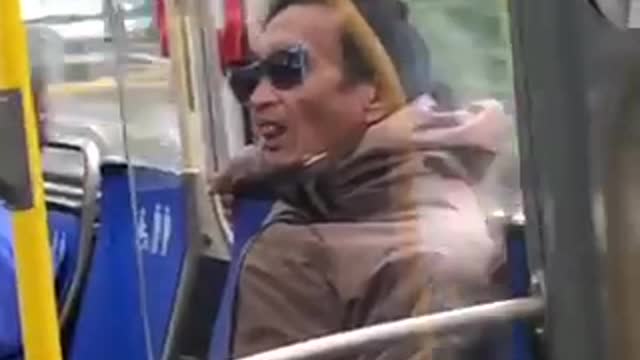 Man flicks his tongue up and down on public bus