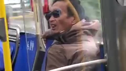 Man flicks his tongue up and down on public bus