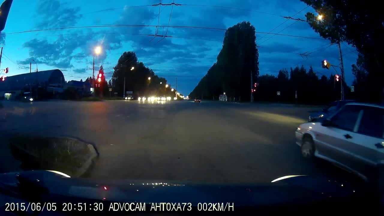 Russian Lada at an intersection sharply enters a bend