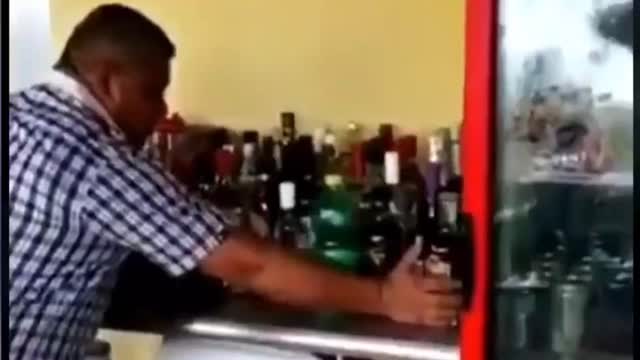 Viral Video Shows Hero Trying to Protect Liquor Bottles During Massive Earthquake