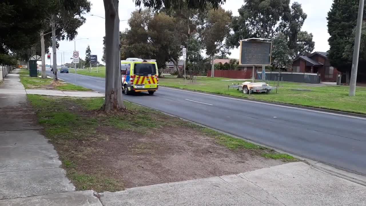 Ambulance & blue car