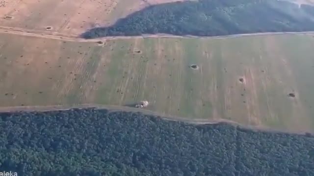 Russian MSTA-C artillery battery hit by Ukrainian counter-battery fire, filmed from UA drone "Stork"