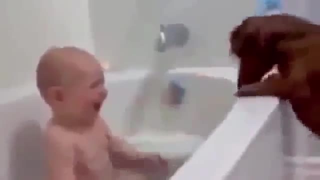 Baby's laugh with Man's best friend