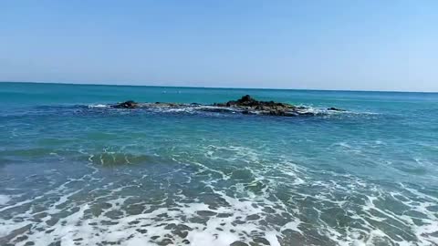 Beautiful colored Korean sea and waves with a reef view