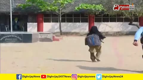 A minor student in Hijab being chased by a 'reporter' outside a school in Karnataka, India