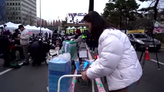 Free coffee and snacks fuel Seoul’s impeachment protesters