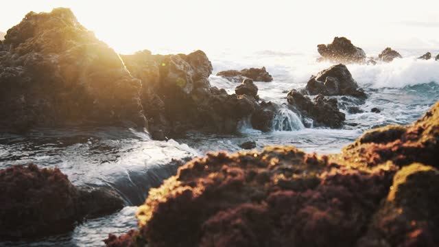 water hitting rocks at America