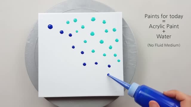 Drops Of Two Different Colors Of Pigments