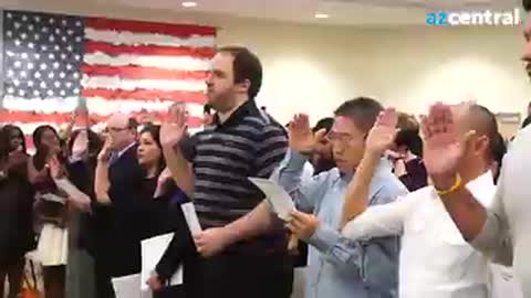 President Donald Trump welcomes newly naturalized immigrants