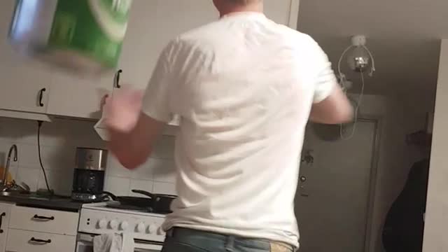 Guy dancing with beer in soviet cap