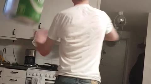 Guy dancing with beer in soviet cap