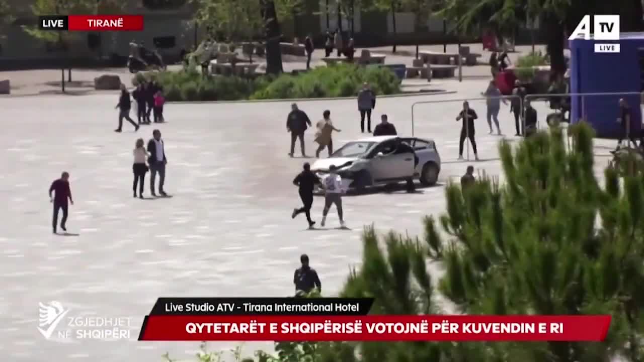 Man stops crazy driver in city square with incredible flying kick through window