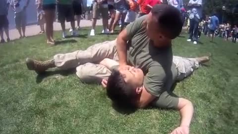 Marines punch kick disarm and throw during MCMAP demo Marine Week St Louis